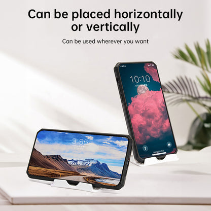 A plastic, foldable cradle for mobile phones