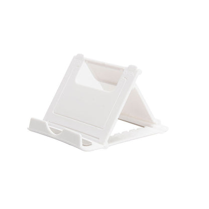 A plastic, foldable cradle for mobile phones