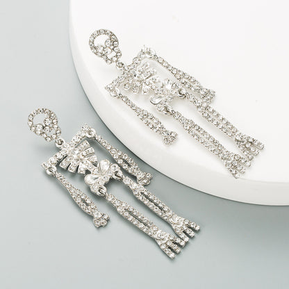 European and American style skull skeleton alloy inlaid rhinestone earrings female personality long exaggerated earrings earrings