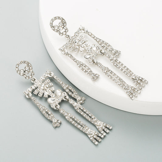 European and American style skull skeleton alloy inlaid rhinestone earrings female personality long exaggerated earrings earrings